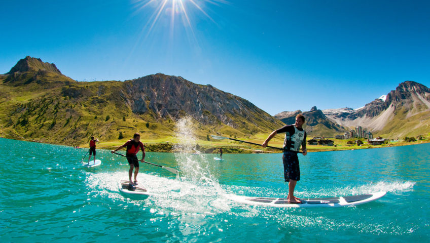 Stand up paddle boarders on Tignes Lake