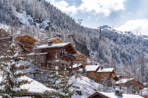 Ski chalets set on snowy hillside