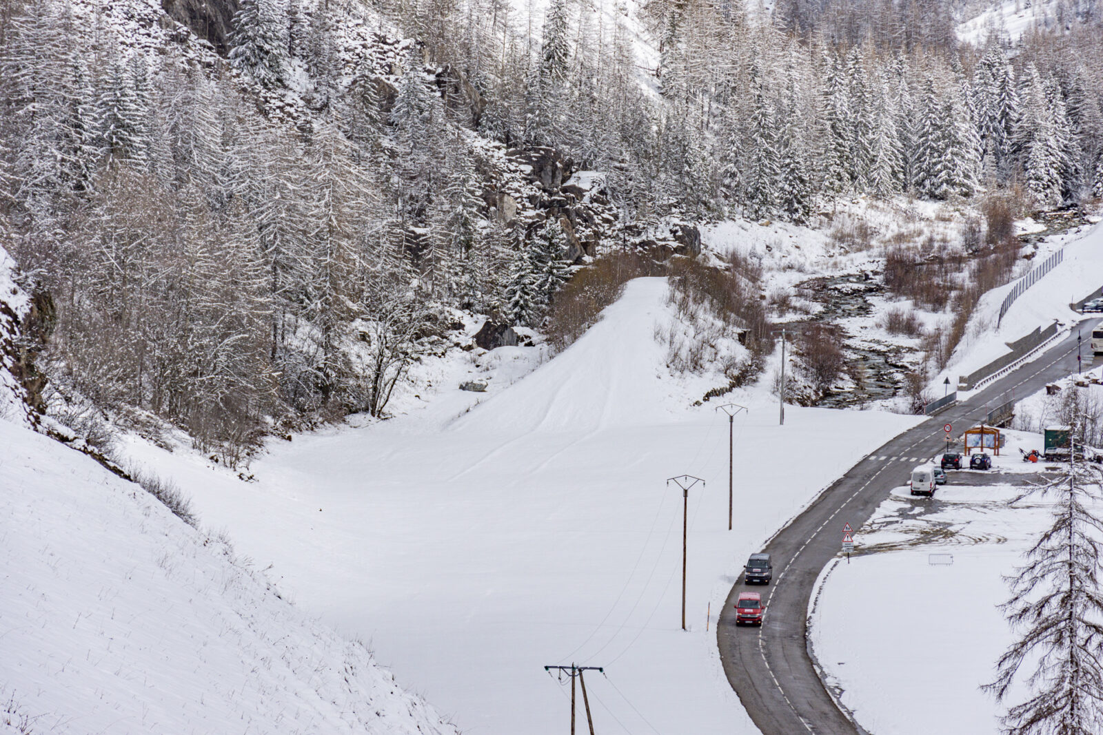 Snowy mountain road from above