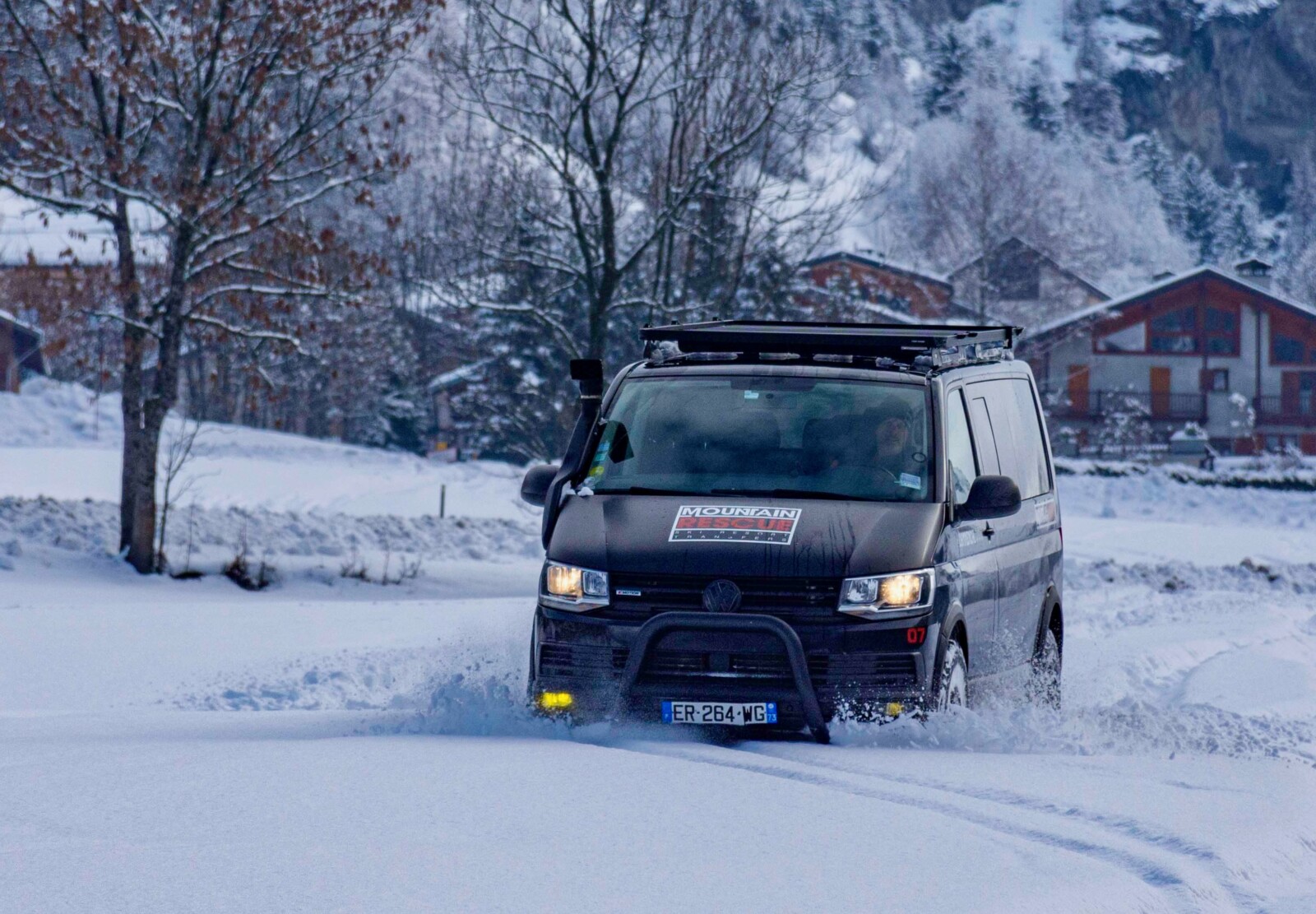 Mountain Rescue Van in deep snow, close up